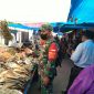 Datangi Pasar, Babinsa Datuk Laksamana Sosialisasikan Pencegahan Covid-19