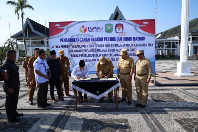 
					Bupati Siak-Ketua PKU dan Bawaslu Tandatangan NPHD Pengawas dan Penyelenggara Pilkada 2024